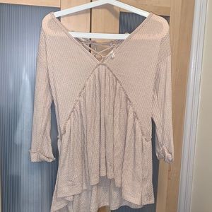 Cute and casual long sleeve flowy top to dress up or down by Sage. Size M.